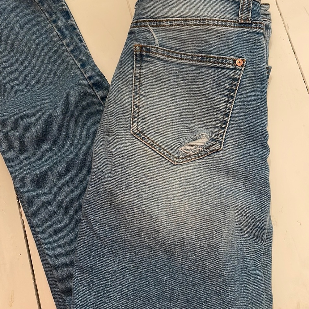 Altar’d State light wash distressed skinny Jean